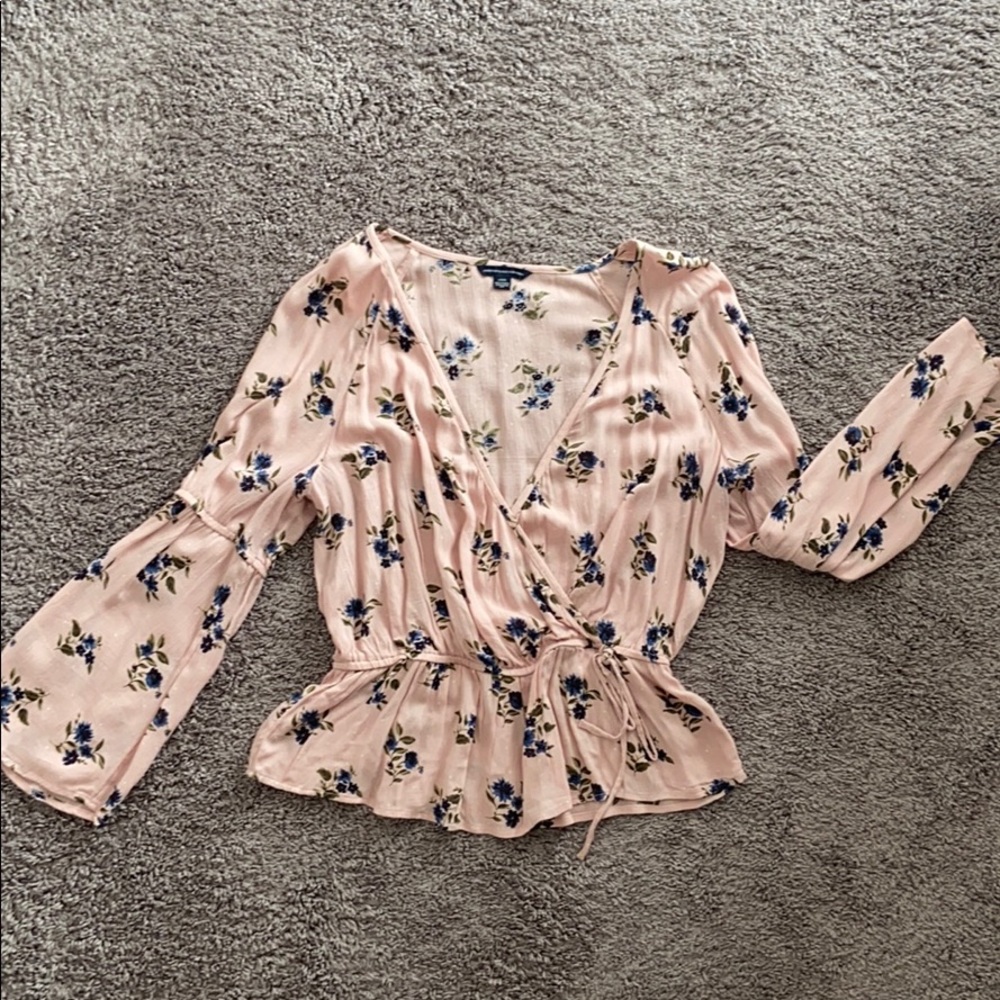Floral peplum and bell sleeve blouse
